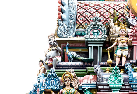 Statues of Hindu gods on the facade of a Hindu temple.の写真素材