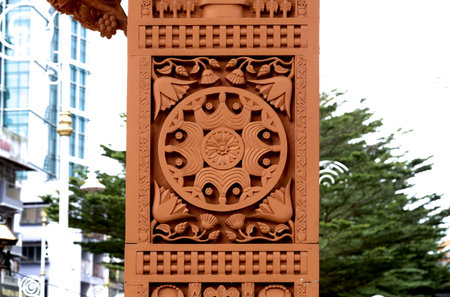 Wood carving on the facade of a building in Kuala Lumpur, Malaysia
