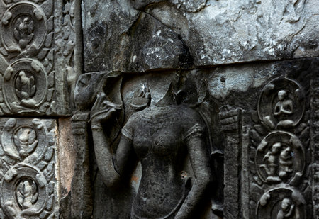 Sculpture on the wall of Angkor Wat, Cambodiaの写真素材