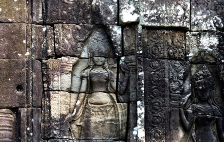 Ancient stone carvings in Angkor Wat, Cambodia.