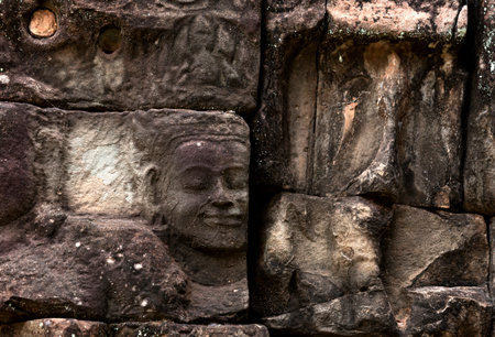 Stone faces at Bayon temple in Angkor Thom, Cambodiaの写真素材