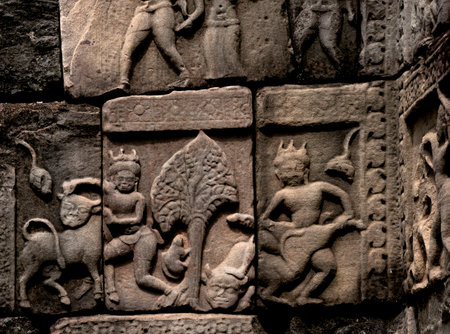 Carvings on the walls of Angkor Wat in Cambodiaの写真素材