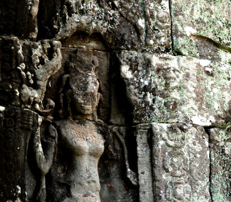 Ancient stone carving on the wall of Angkor Wat, Cambodiaの写真素材