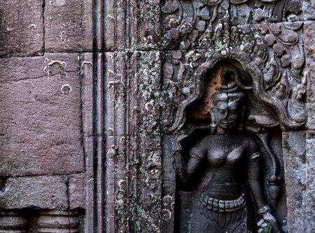 Ancient stone carving in Angkor Wat, Siem Reap, Cambodiaの写真素材