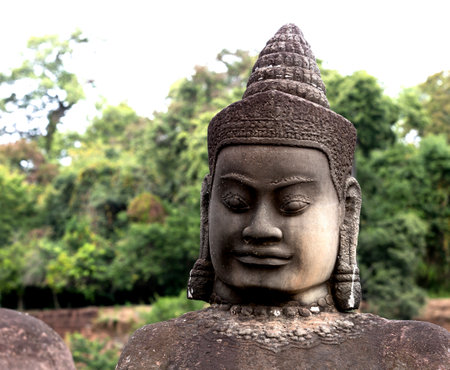 Face of buddha statue in Angkor Wat, Cambodiaの写真素材