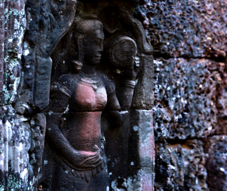 Ancient stone carving in Angkor Wat, Siem Reap, Cambodiaの写真素材