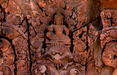 Sculpture on the walls of Banteay Srei temple, Cambodiaの写真素材