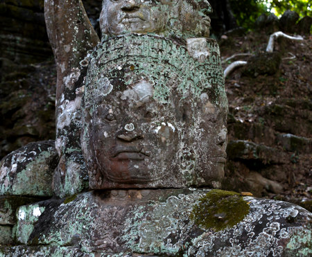 Stone head of buddha in Angkor Thom, Siem Reap, Cambodiaの写真素材