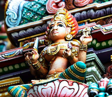 Statue of Hindu God Ganesha on the temple wall.の写真素材