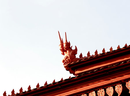 Thai style temple roof with dragon statue in thai style.の写真素材