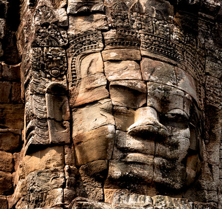 Stone faces of Bayon temple in Angkor Thom, Cambodiaの写真素材
