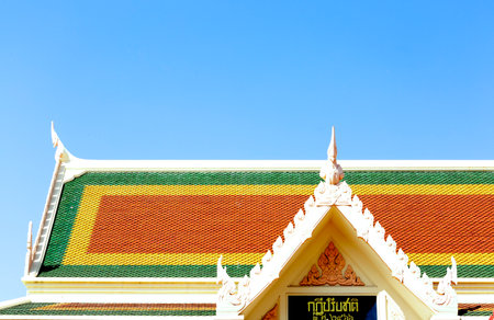 Thai temple roof with blue sky background, Bangkok, Thailand.の写真素材