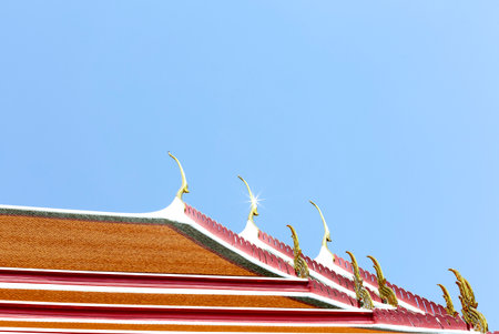 Thai temple roof on blue sky background, Wat Phra Kaewの写真素材