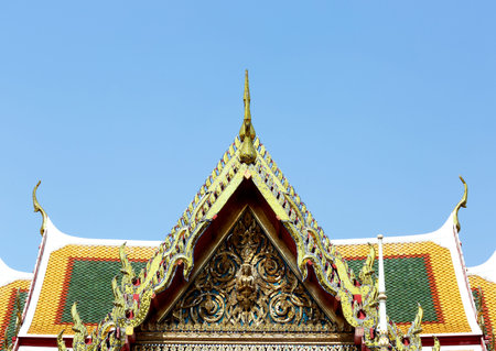 thai temple roof with blue sky background, bangkok, thailand