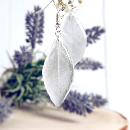 Transparent leaf shaped handmade earrings, epoxy resin,の写真素材