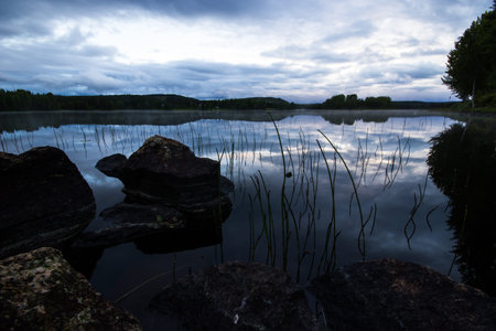 Sunset over Lake in Swedenの写真素材