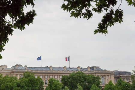 The French and EU Flag on Paris Buildingの写真素材