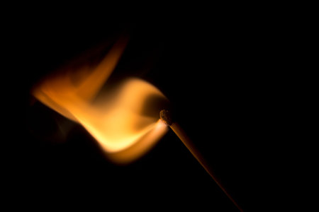 Match Igniting in a burst of fire