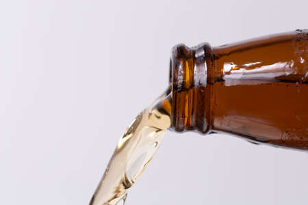 Beer Pouring From Bottleの写真素材