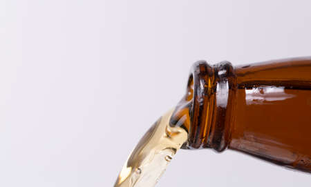 Beer Pouring From Bottleの写真素材