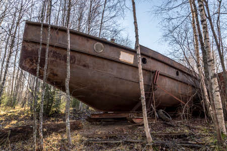 Old Rusy Boat on Landの写真素材