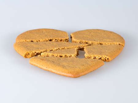 Gingerbread Heart Broken into piecesの写真素材