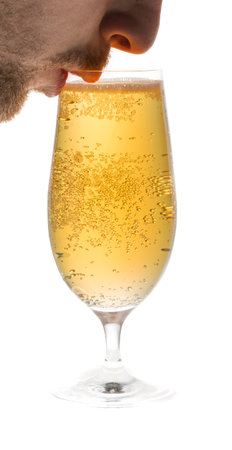 Male Drinking Beer From Glassの写真素材