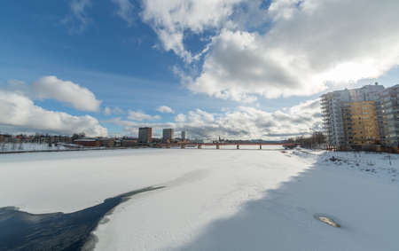 Downtown Umea, Sweden and its river in winterの写真素材