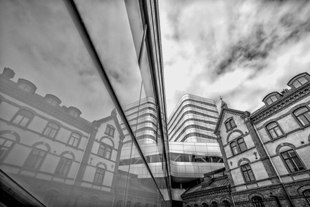 Buildings Downtown Umea, Sweden with a cloudy sky