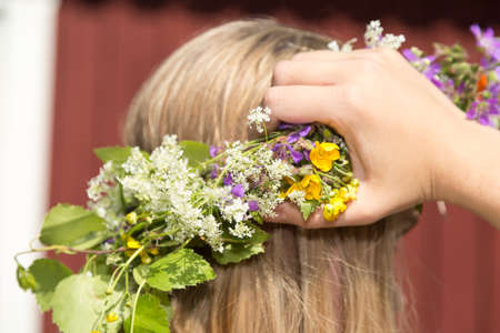 Swedish Midsummer Headgear Traditional on a female head of hair.の写真素材
