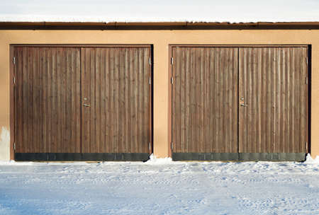 Pair of Garage Doors with snow.の写真素材