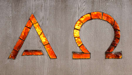 Alpha and Omega Signs in glass.の写真素材