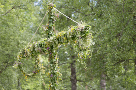 Swedish Maypole Covered in Flowers.の写真素材