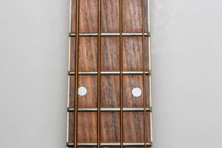 Acoustic Bass Guitar Fretboard Close Up.の写真素材