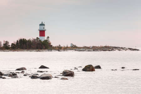 Light House in Holmsund, Sweden with a cloudy sky.の写真素材