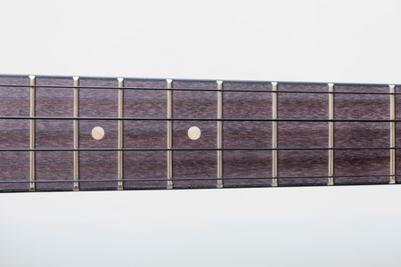 Ukulele Fretboard Close Up on white.
