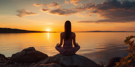 a girl is doing yoga near the water at sunset. High quality photo. Generative AIの素材