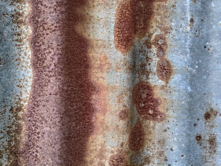 The pattern of rust stains on the surface of the zinc plate.の写真素材
