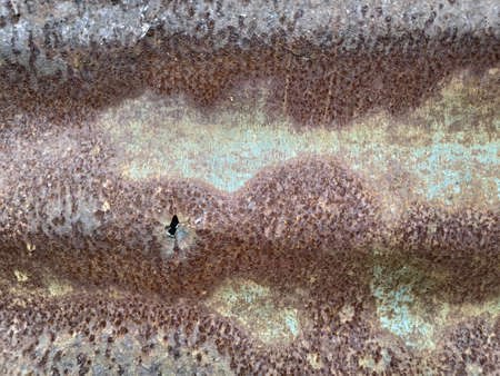 The pattern of rust stains on the surface of the zinc plate.の写真素材