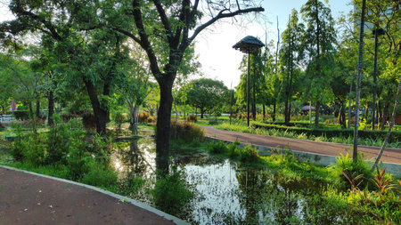 Red jogging track in Bangkok, Thailand public park.