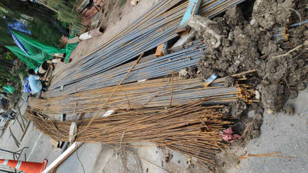 Stock Photo - The reinforcing bars are rusted around the construction site.の写真素材