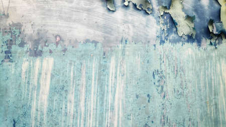 Stock Photo - Abstract cracked paint texture of the corroded blue paint of the iron gate.の写真素材