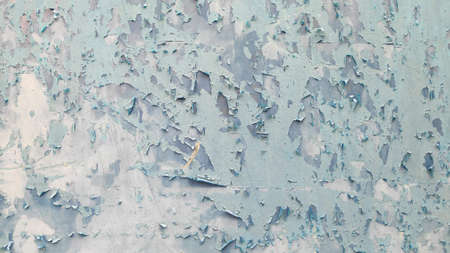 Stock Photo - Abstract cracked paint texture of the corroded blue paint of the iron gate.の写真素材