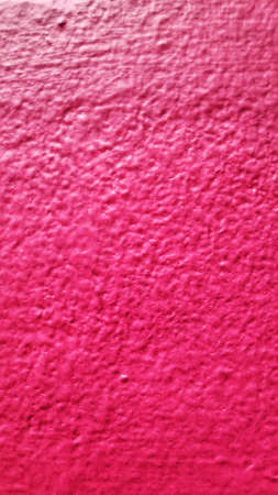Stock Photo - Old building with red and pink background on cement wall surface.の写真素材