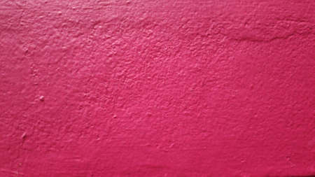 Stock Photo - Old building with red and pink background on cement wall surface.の写真素材