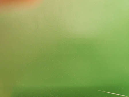 Green plastic shelf material texture as backdrop.の写真素材