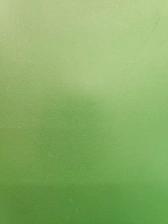 Green plastic shelf material texture as backdrop.の写真素材