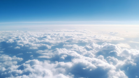Beautiful aerial view above clouds with blue sky.Concept of travel and tourism.の素材