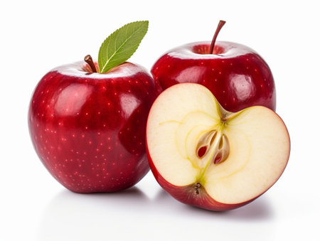 Red apples with one cut in half and two with half and leaf isolated on white background,clipping pathの素材