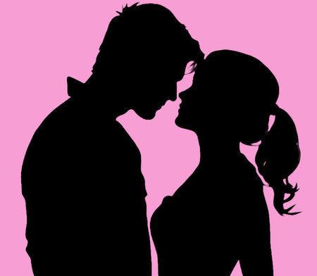 Silhouette of a man and a woman on a pink background.Wedding concept.の素材